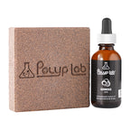Polyplab Genesis Rock Booster, Genesis Rock block next to the Genesis 50 ml bacteria bottle, out of the box