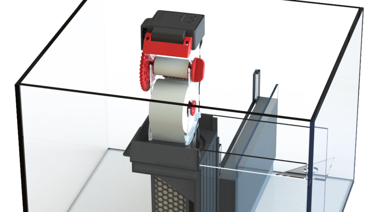 Red Sea NanoMat roller filter installed in a glass sump compartment